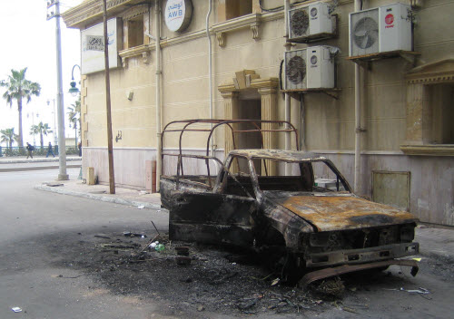 BURNT OUT CAR NEAR CORNICHE