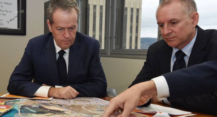 Bill Shorten (left) and South Australia Premier Jay Wetherill look at a map of Whyalla Port