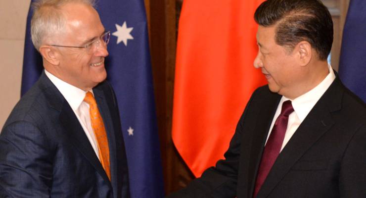 Malcolm Turnbull and Xi Jinping shake hands