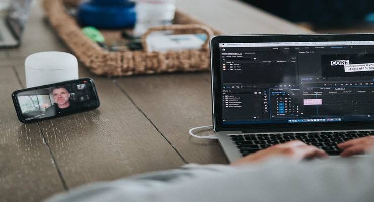 man-on-remote-call-with-laptop