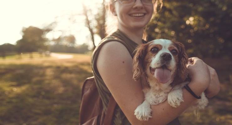 woman-holding-dog