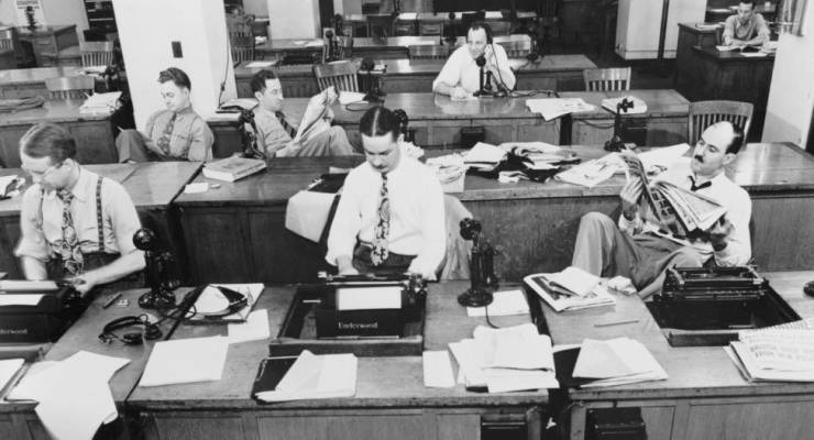 journalists in a newsroom