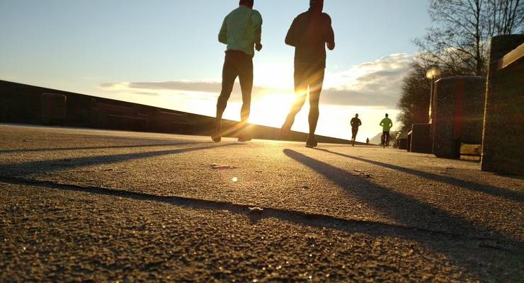 two-men-running-in-park