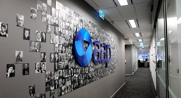 AAP logo on wall of corridor of office