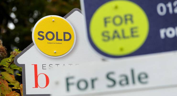 for-sale-sign-outside-house