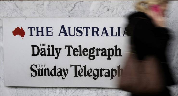 The Australian, The Daily Telegraph and The Sunday Telegraph logos on building