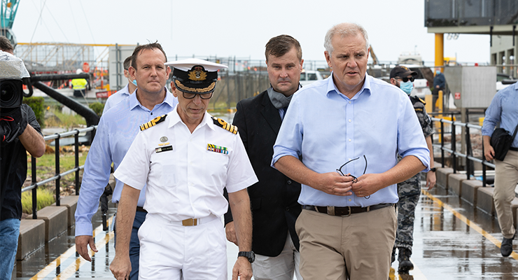 Scott Morrison with Royal Australian Navy Commander Moses Raudino (Image: George Fragopoulos/AAP)
