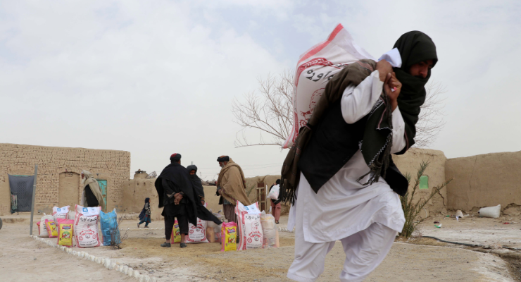 People receiving rations in Afghanistan, February 2022 (Image: AAP/Stringer)