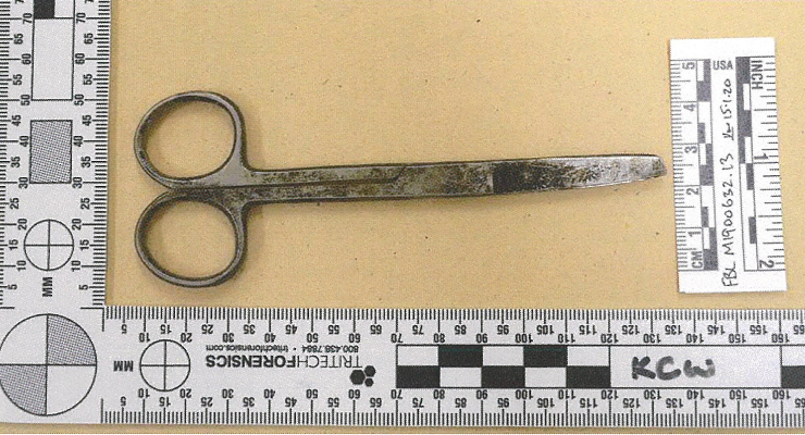 An exhibit picture tendered during the trial of Zachary Rolfe shows the scissors Kumanjayi Walker used to stab Rolfe