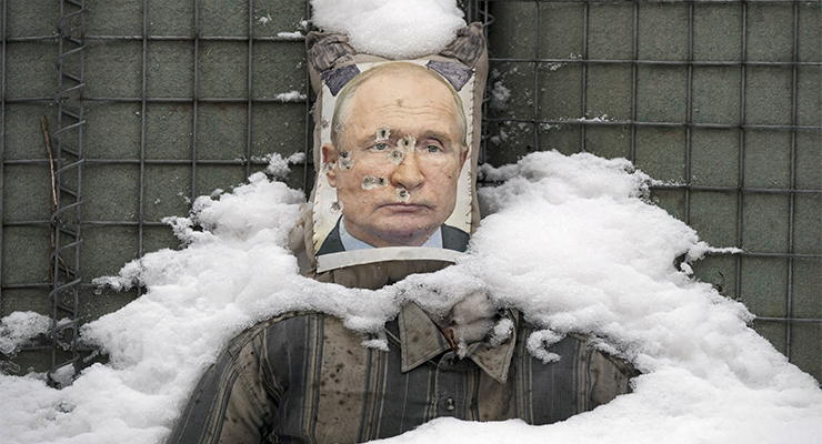 A bullet-riddled Putin effigy in Ukraine, 2022 (Image: AAP/Vadim Ghirda)