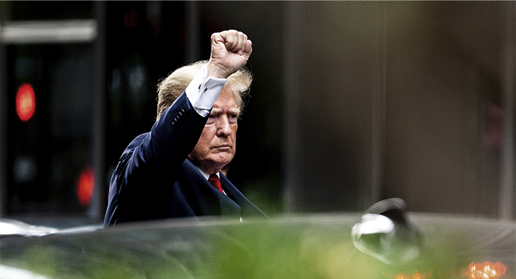 Former US president Donald Trump in transit to deposition in a civil investigation (Image: AAP/AP/Julia Nikhinson)
