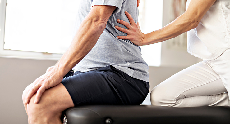 Modern rehabilitation physiotherapy worker with senior client (Image: Adobe)