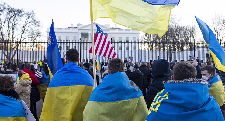 Protesters march outside the White House (Image: AAP/Jim Lo Scalzo)