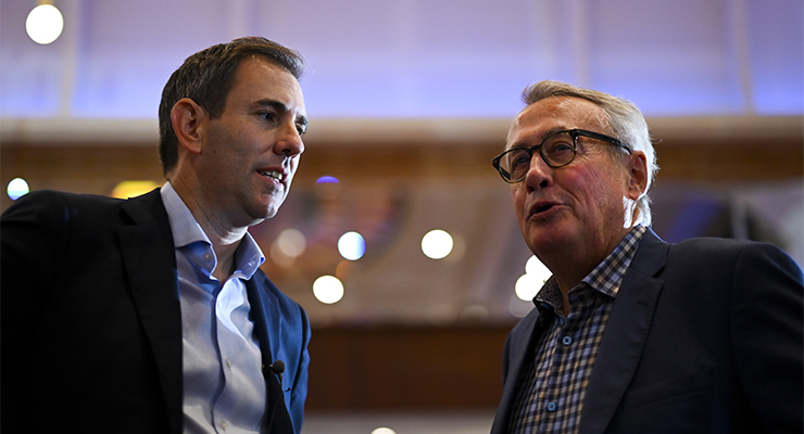 Treasurer Jim Chalmers with former treasurer Wayne Swan (Image: AAP/Lukas Coch)