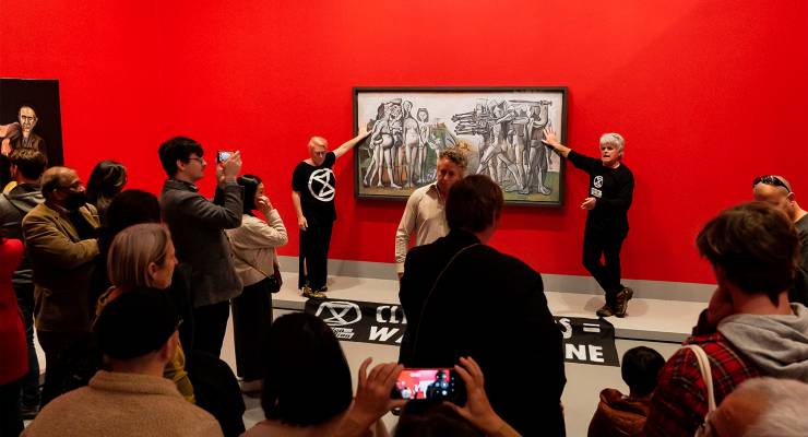 Extinction Rebellion protesters glued to a Picasso painting at the NGV (Image: AAP/Matt Hrkac)