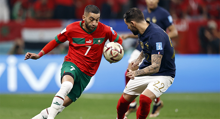 Hakim Ziyech of Morocco and Theo Hernandez of France (Image: AAP/AP/Dutch Height/Maurice of Stone/ANP/Sipa USA)
