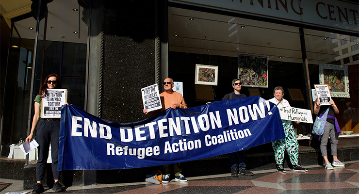 Protesters rally outside the Downing Centre Court in Sydney