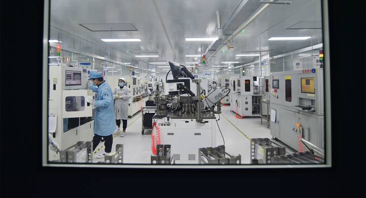 A worker at a semiconductor company in Jiangsu province, China (Image: AAP/CFOTO/Sipa USA)
