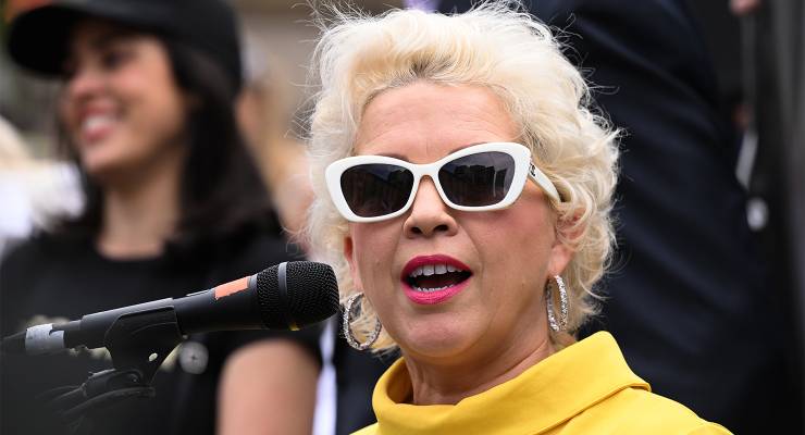 UK anti-trans activist Kellie-Jay Keen on the steps of Parliament House in Melbourne (Image: AAP/James Ross)