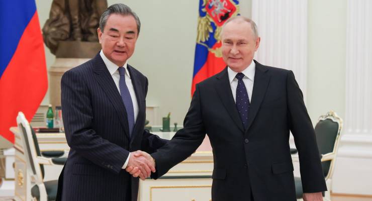 China's Foreign Affairs Minister Wang Yi meets Russian President Vladimir Putin in Moscow last month