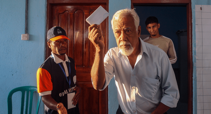 Xanana Gusmão holds his ballot paper as he casts his vote in Dili, Timor-Leste (Image: AAP/Antonio Dasiparu)