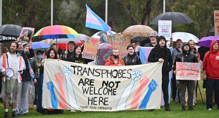 LGBTQIA+ protesters voice opposition to a Canberra anti-trans rally