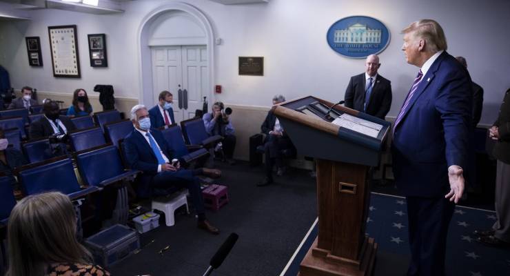 Donald Trump speaks to the press at the White House