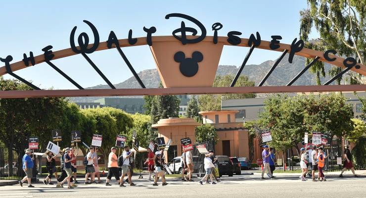 Picketers outside Disney studios in California, July 20 2023 (Image: Richard Shotwell/Invision/AP)