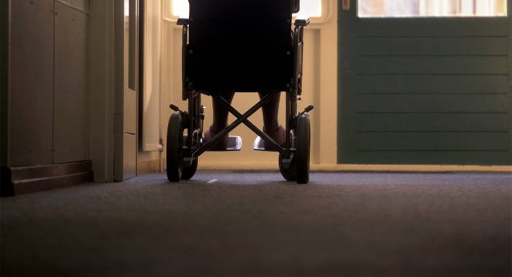 A woman in a wheelchair in a nursing home (Image: Adobe)