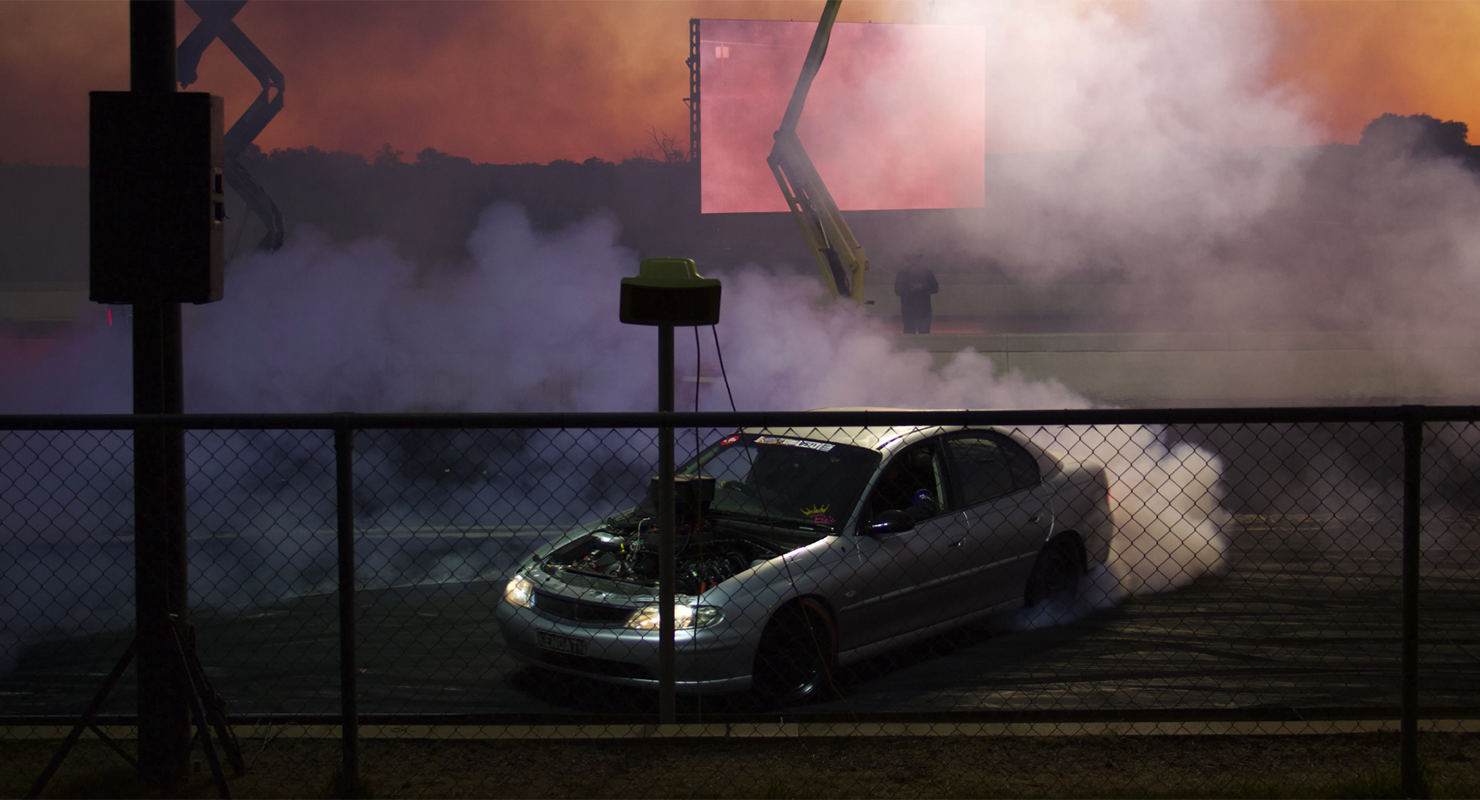 A car does a burnout at the Alice Springs Inland dragway (Image: Julia Bergin)