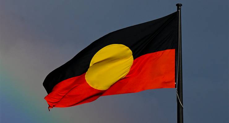 An Aboriginal flag in Canberra (Image: AAP/Lukas Coch)