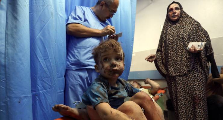 Wounded Palestinians receive treatment at the al-Shifa hospital in Gaza City