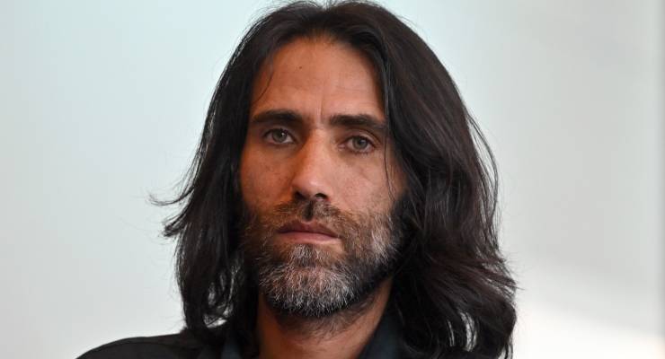 Former refugee Behrouz Boochani at a press conference at Parliament House in Canberra