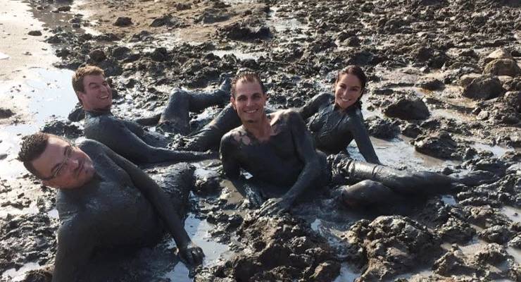 A photo of Bevan Shields, David Lipson, Ben English and Sharri Markson on the banks of the Dead Sea, as originally published by the AFR (Image: AFR)
