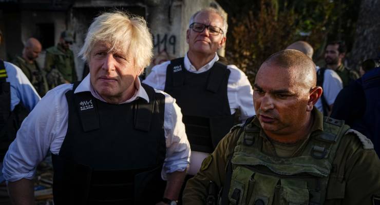 Scott Morrison (centre) with his 'good friend' former UK PM Boris Johnson in Israel (Image: AP/Ariel Schalit)