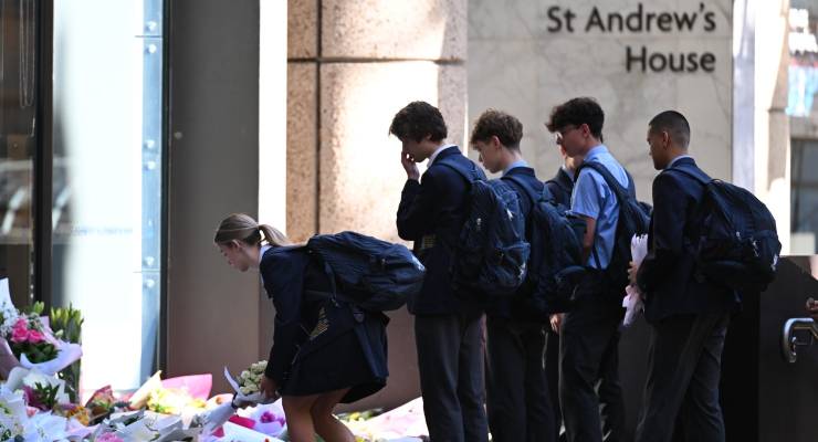 St Andrew’s students lay flowers in memory of Lilie James (Image: AAP/Dean Lewins)