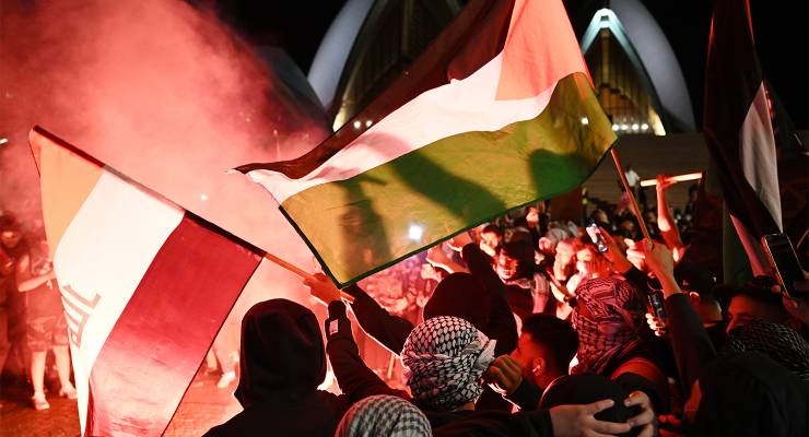 Participants of a Free Palestine rally outside the Sydney Opera House on October 9, 2023 (Image: AAP/Dean Lewins)