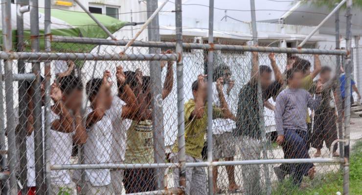 Asylum seekers held at the Manus Island detention complex in 2014 (Image: AAP/Eoin Blackwell)
