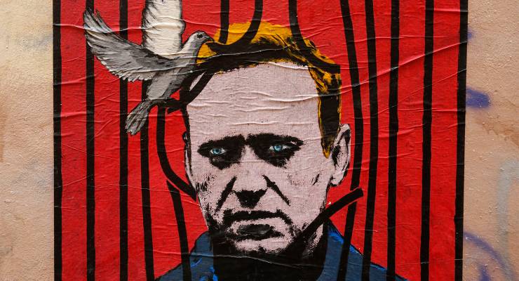A poster depicting Russian opposition leader Alexei Navalny (Image: AAP/FABIO FRUSTACI)