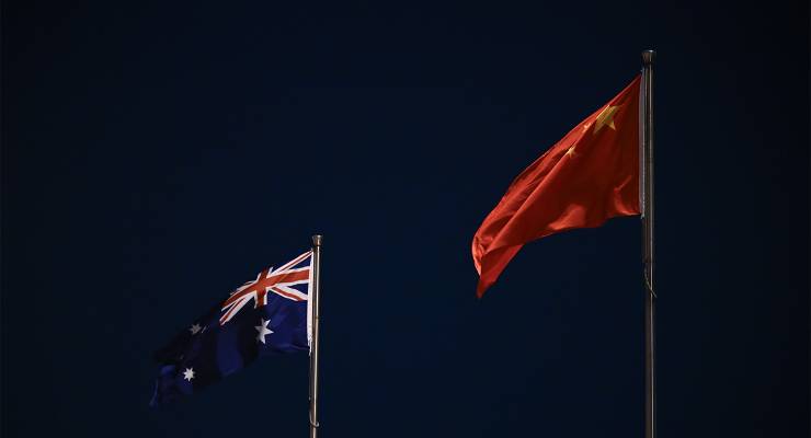The national flags of Australia and China (Image: AAP/Lukas Coch)