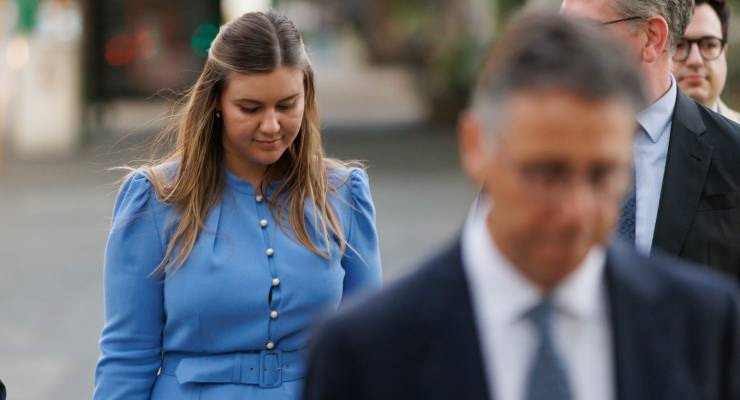 Brittany Higgins leaving mediation talks with Linda Reynolds (Image: AAP/Richard Wainwright)