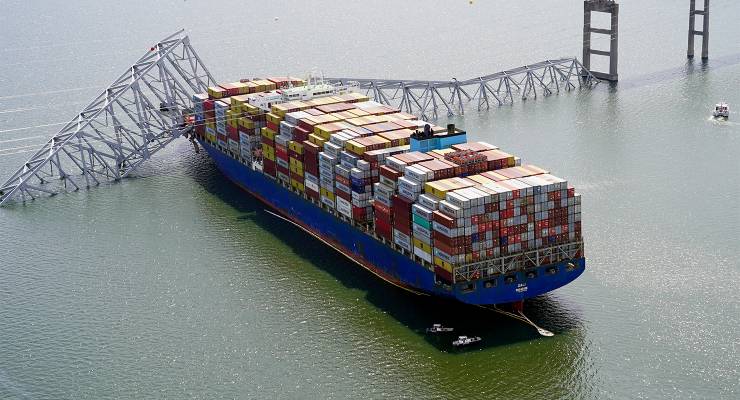 The cargo ship Dali stuck under the collapsed Francis Scott Key Bridge in Baltimore. (Image: AAP/Maryland National Guard)