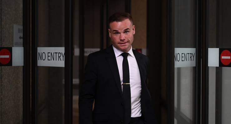 Former Seven staffer Taylor Auerbach leaves the Federal Court, April 4 (Image: AAP/Dean Lewins)
