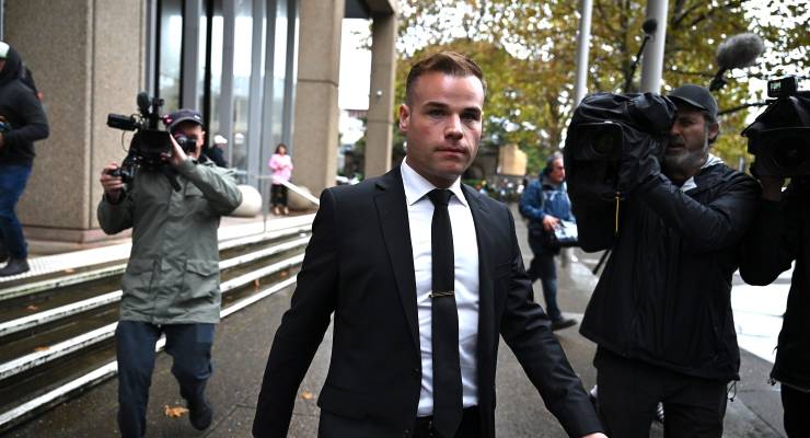 Ex-Seven staffer Taylor Auerbach leaves the Federal Court after giving evidence in the Bruce Lehrmann defamation case, Thursday April 4 (Image: AAP/Dean Lewins)